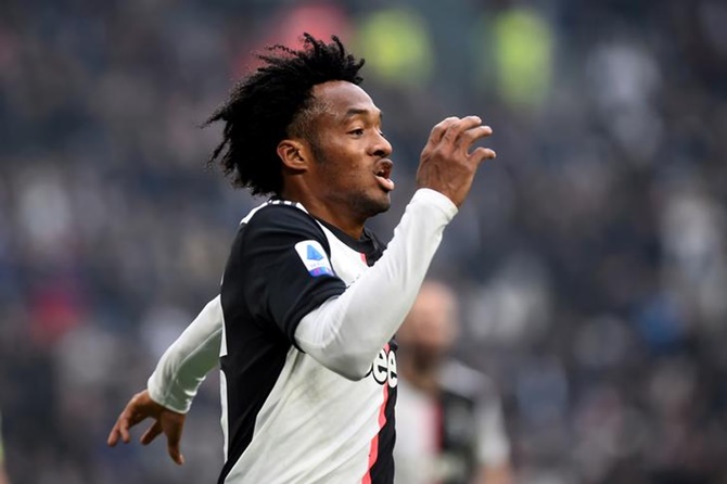 Juan Cuadrado celebrates scoring Juventus's second goal.