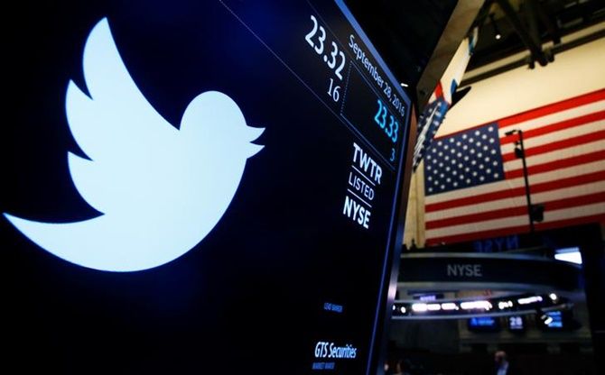 The Twitter logo is displayed on a screen on the floor of the New York Stock Exchange (NYSE) in New York City.