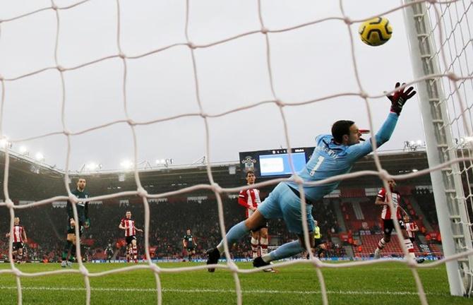 Matej Vydra, right, scores Burnley's second goal. 