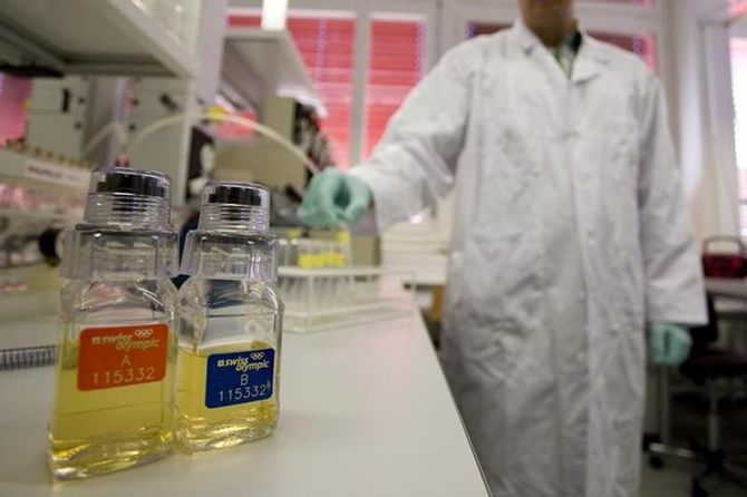 Urine samples are pictured at the Swiss Laboratory for Doping Analysis in Epalinges near Lausanne July 15, 2008