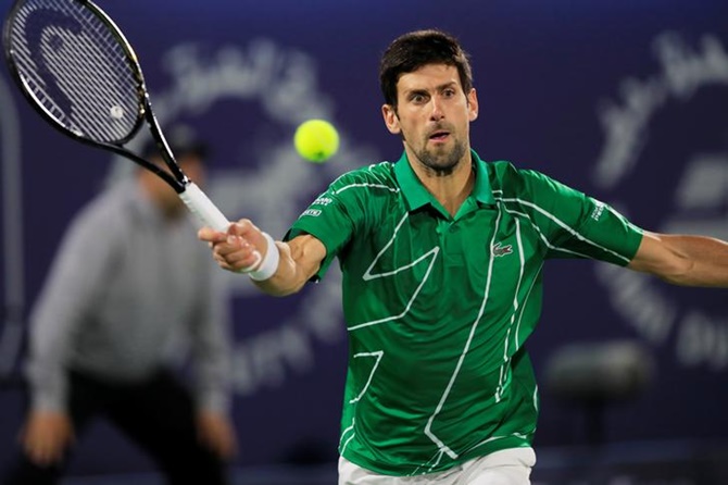 Serbia's Novak Djokovic in action during his quarter final match against Russia's Karen Khachanov at the Dubai Open. 