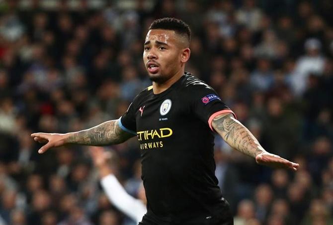 Gabriel Jesus celebrates scoring Manchester City's first goal.