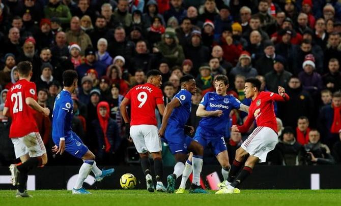 Manchester United's Mason Greenwood scores against Everton at Old Trafford