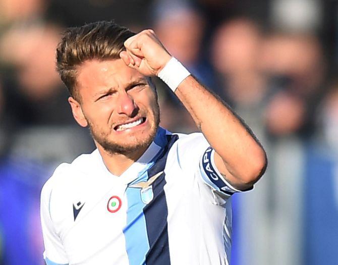 Lazio's Ciro Immobile celebrates scoring their second goal against Brescia during their Serie A match at Stadio Mario Rigamonti in Brescia, Italy, on Sunday