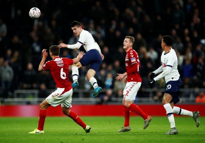 Tottenham Hotspur's Giovani Lo Celso in action with Middlesbrough's Dael Fry during their FA Cup third round replay at Tottenham Hotspur Stadium in London on Tuesday 