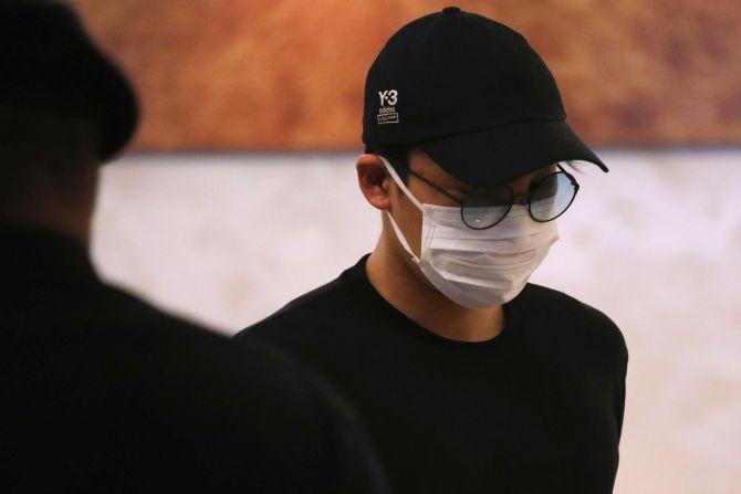 Japanese badminton player Kento Momota arrives at Kuala Lumpur International Airport, as he leaves for Tokyo, after he was released from hospital in Sepang, Malaysia on Wednesday