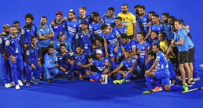 A jubilant Indian team pose for pictures after their victory over Netherlands in the FIH Pro League (Men) 2020 hockey match at Kalinga Stadium in Bhubaneswar on Sunday