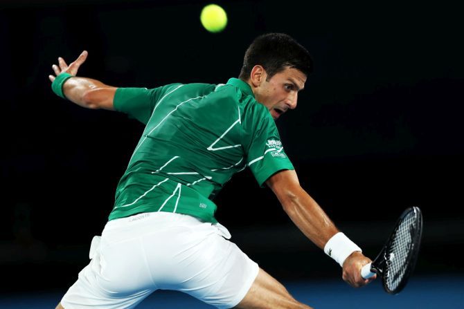Serbia's Novak Djokovic plays a backhand during his first round match against Germany's Jan-Lennard Struff