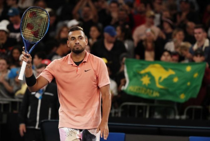 Australia's Nick Kyrgios celebrates after winning his Australian Open first-round match against Italy's Lorenzo Sonego on Tuesday