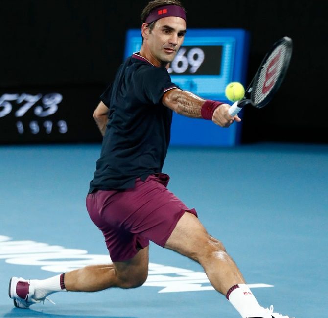 Switzerland's Roger Federer plays a backhand in his second round match against Serbia's Filip Krajinovic