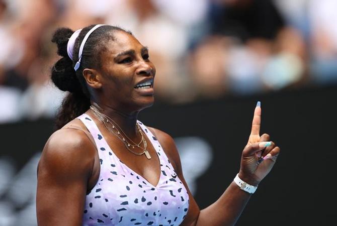 Serena Williams reacts during her third round match against China's Qiang Wang at the Australian Open on Friday.