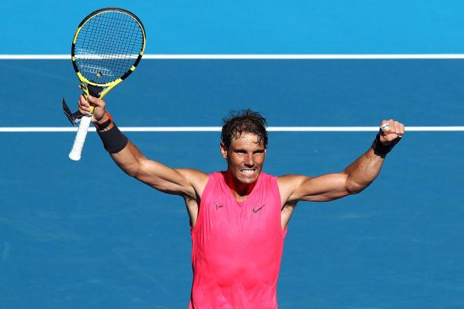 Spain's Rafael Nadal celebrates after winning his third round match against compatriot Pablo Carreno Busta