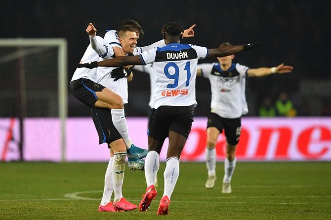 Atlanta's Josip Ilicic, centre,  celebrates scoring with teammates during the Serie A match against Torino FC