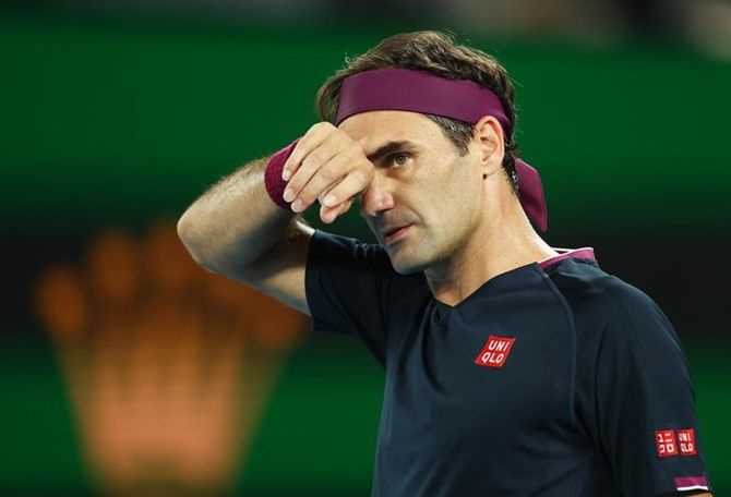 Roger Federer reacts during his semi-final against Novak Djokovic.