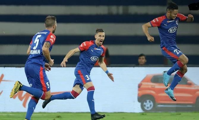 Bengaluru FC players celebrate after Nishu Kumar (No. 22) scores in Thursday’s ISL match against Hyderabad FC in Bengaluru