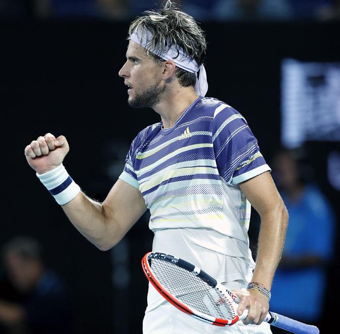 Dominic Thiem of Austria celebrates after winning a point