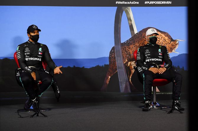 Mercedes' Valtteri Bottas and Lewis Hamilton wearing protective face masks during the press conference after qualifying of the Austrian F1 Grand Prix at the Red Bull Ring in Spielberg, Styria, Austria on Saturday 