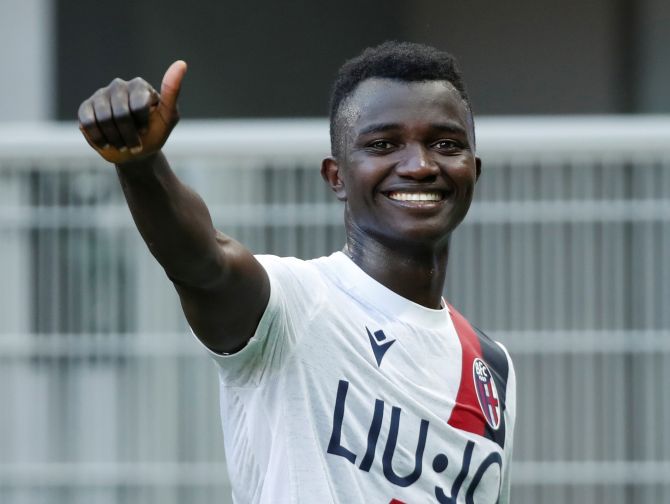 Bologna's Musa Juwara celebrates after the match against Inter Milan in their Serie A match at San Siro in Milan on Sunday 