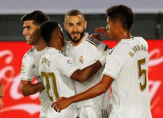Real Madrid's Karim Benzema celebrates scoring their first goal against Alaves at Alfredo Di Stefano Stadium, Madrid, on Friday