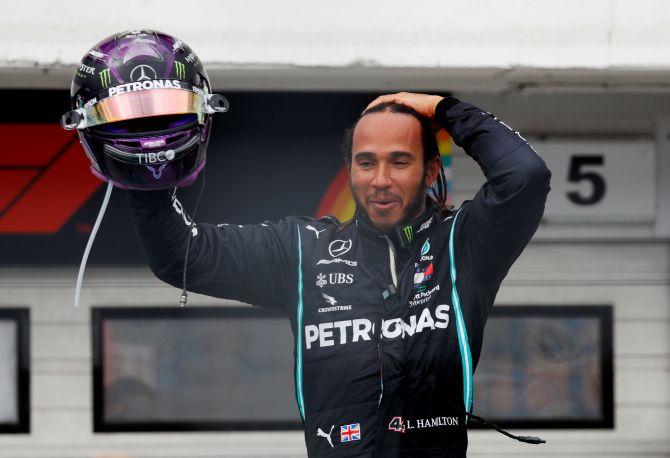 Mercedes' Lewis Hamilton celebrates winning the Hungarian F1 Grand Prix race at Hungaroring, Budapest, Hungary on Sunday 