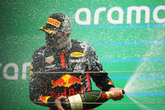 Max Verstappen celebrates on the podium