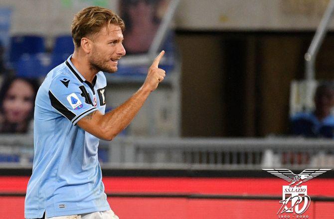 Lazio's Ciro Immobile celebrates after scoring against Cagliari on Thursday. He scored his 31st goal of the season, surpassing Cristiano Ronaldo's tally of 30 goals so far in the season.