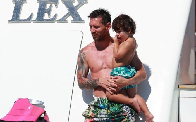 Lionel Messi with his son