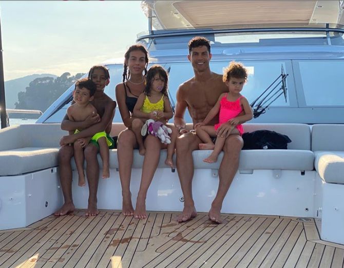 Cristiano Ronaldo and family are all smiles on holiday