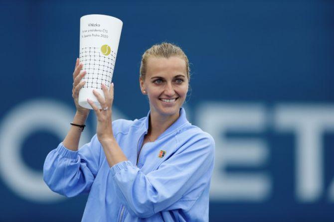 Czech Republic's Petra Kvitova celebrates with the trophy after defeating Czech Republic's Karolina Muchova to win the All-Czech Tennis Tournament at TK Sparta Prague, in Prague, Czech Republic, on May 28. 