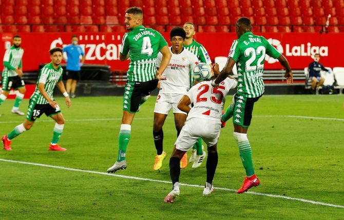 Sevilla's Fernando scores their second goal against Real Betis