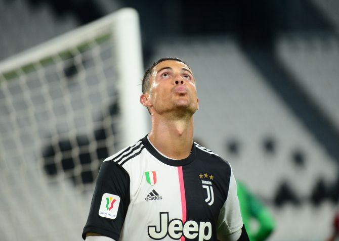 Juventus' Cristiano Ronaldo reacts after missing a penalty against AC Milan during their Coppa Italia semi-final second leg tie at Allianz Stadium, Turin. 
