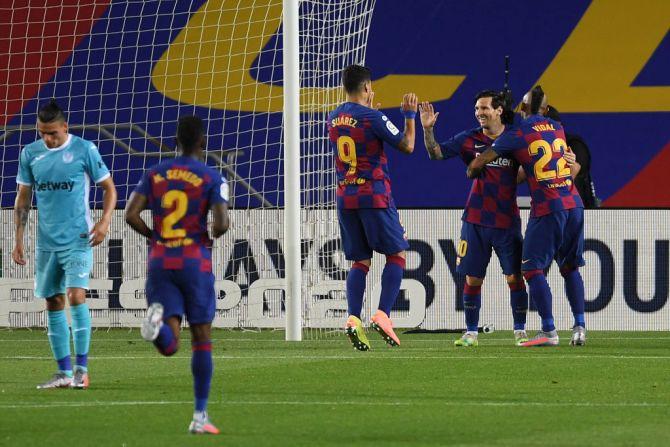 FC Barcelona's Lionel Messi celebrates after scoring the second goal from the penalty spot during their Liga match against CD Leganes at Camp Nou in Barcelona on Tuesday