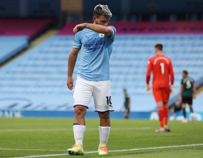 Manchester City's Sergio Aguero walks off to be substituted after sustaining an injury during their EPL match against Burnley at Etihad Stadium in Manchester on Monday