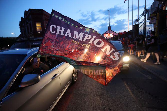 Liverpool fans celebrate the EPL title win on Thursday