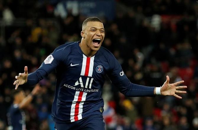 Kylian Mbappe celebrates scoring Paris St Germain's fourth goal against Dijon in the Ligue 1 match at Parc des Princes, in Paris, on Saturday.