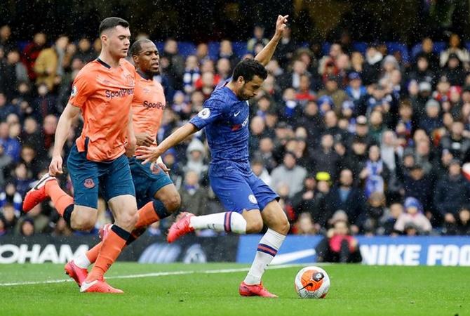 Pedro scores Chelsea's second goal in the Premier League match against Everton, at Stamford Bridge, London, on Sunday. 