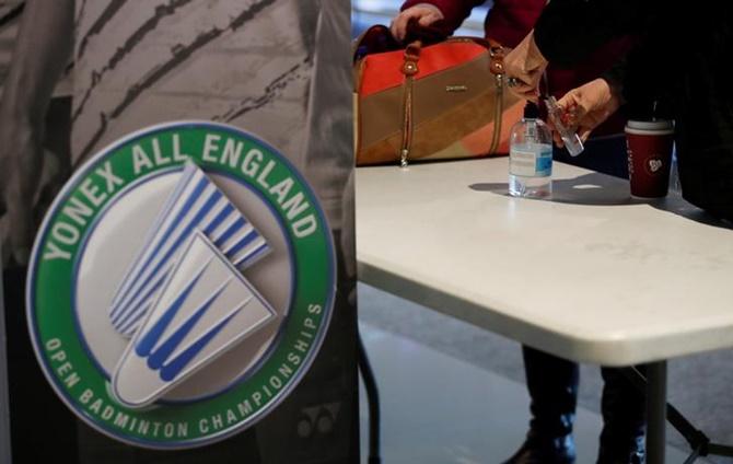 A fan uses hand sanitizer at Arena Birmingham, during the All England Open Badminton Championships