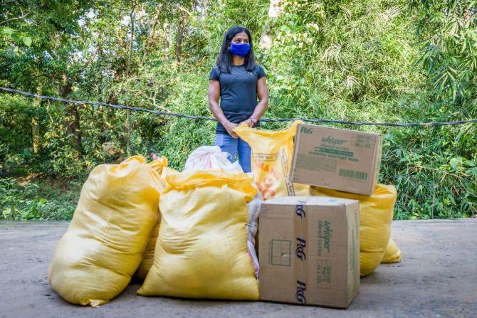 Dutee Chand with the food supplies meant to be donated to her villagers