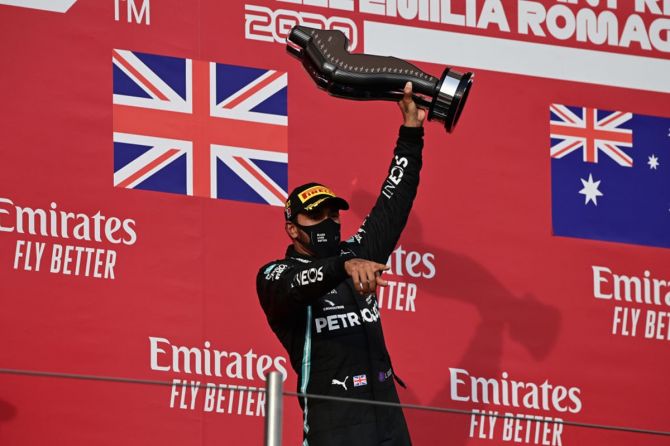 Lewis Hamilton of Mercedes GP celebrates on the podium after winning the F1 Grand Prix of Emilia Romagna, at Autodromo Enzo e Dino Ferrari, in Imola, Italy, on Sunday. 