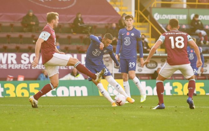 Hakim Ziyech scores Chelsea's opening goal during the Premier League match against Burnley at Turf Moor, in Burnley