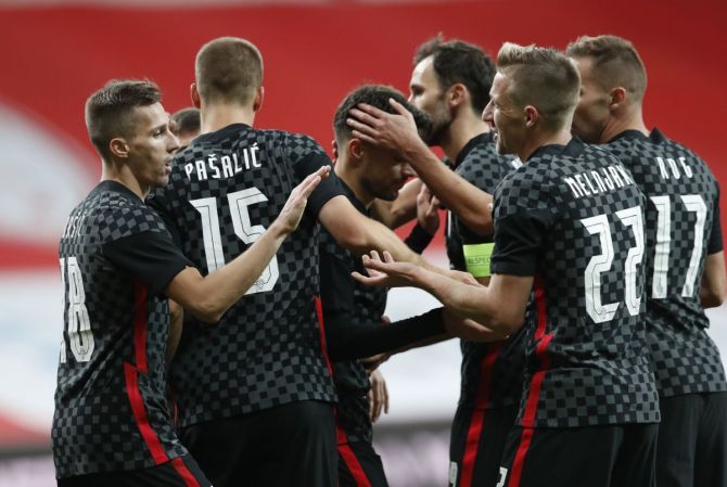 Croatia's Mario Pasalic celebrates with teammates on scoring their second goal against Turkey at Vodafone Park, Istanbul 