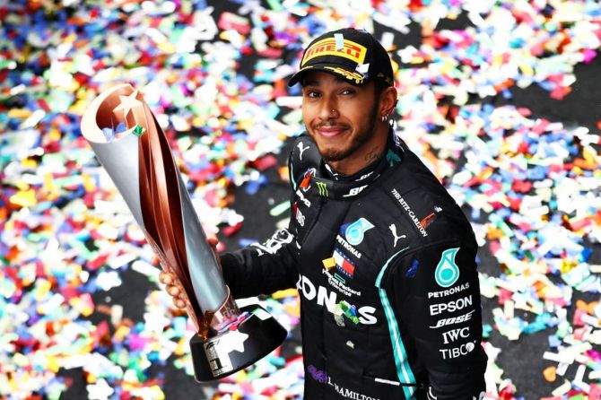 Mercedes GP's Lewis Hamilton celebrates winning a 7th F1 World Drivers Championship in parc ferme at the F1 Grand Prix of Turkey at Intercity Istanbul Park in Istanbul, Turkey, on Sunday
