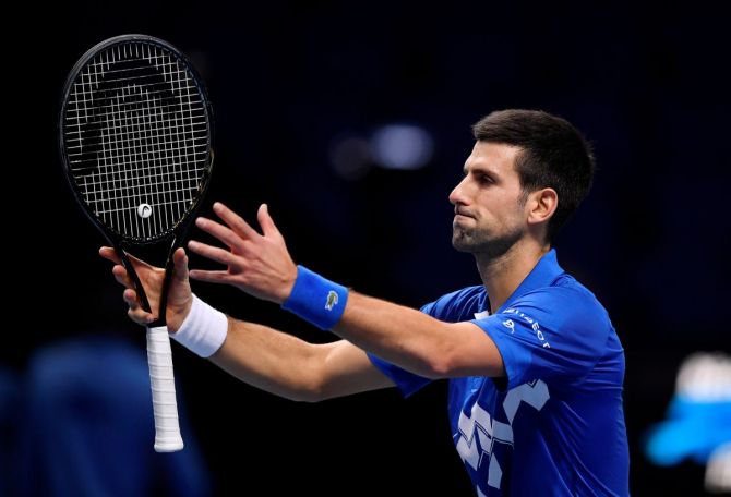 Serbia's Novak Djokovic celebrates winning his group stage match against Germany's Alexander Zverev at the ATP Finals at the 02 Arena in London on Friday 