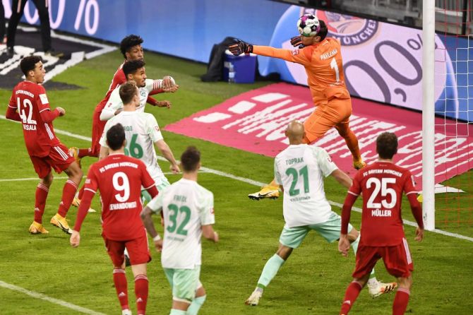 Bayern Munich's Kingsley Coman scores their first goal against Werder Bremen during their Bundesliga match at Allianz Arena, Munich, Germany, on Saturday 
