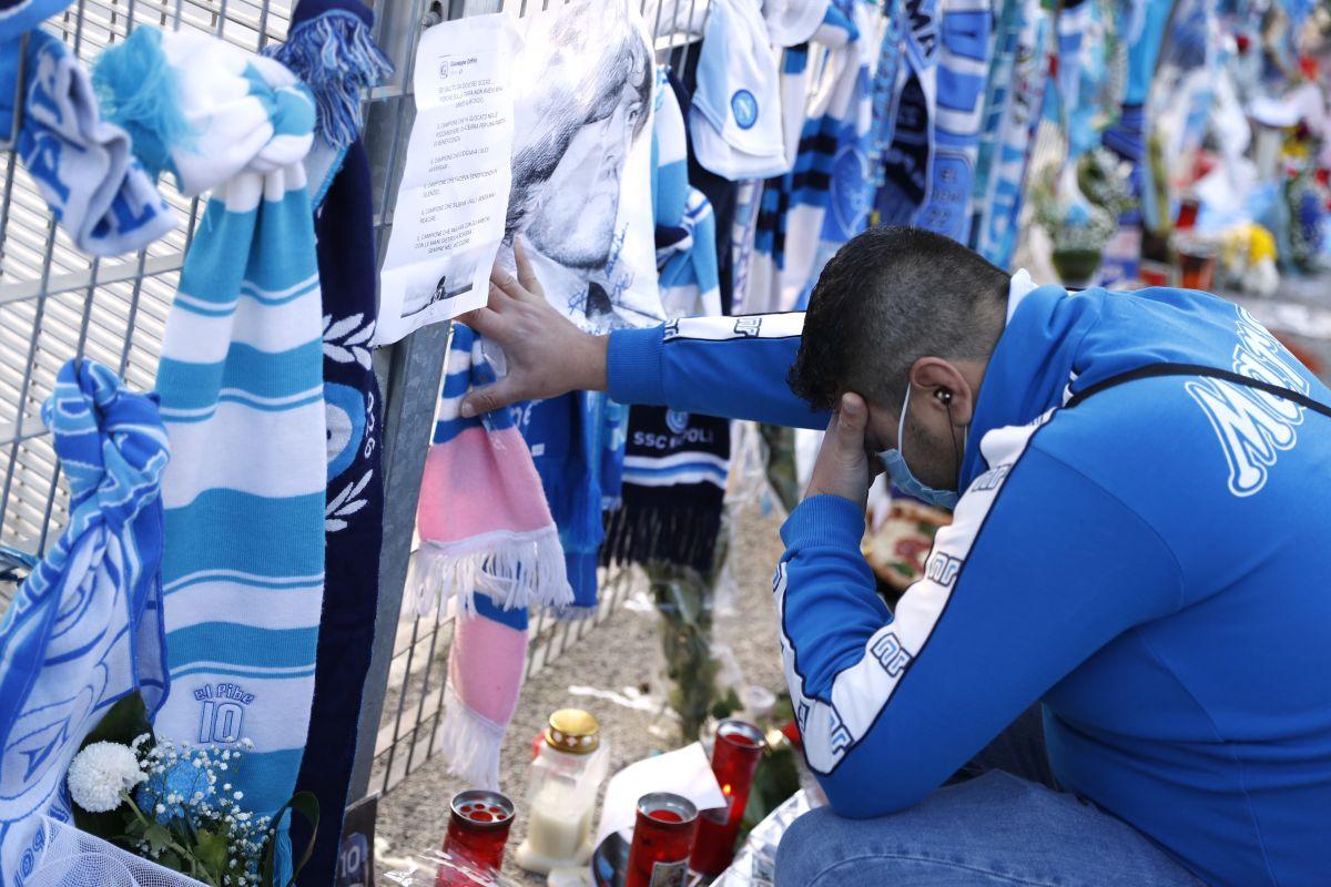 A fan mourns the death of Argentine soccer legend Diego Maradona, in Naples