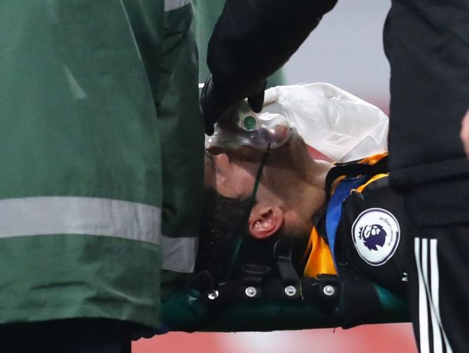 Wolverhampton Wanderers' Raul Jimenez is stretchered off after a head collision during the EPL match against Arsenal in London on Sunday