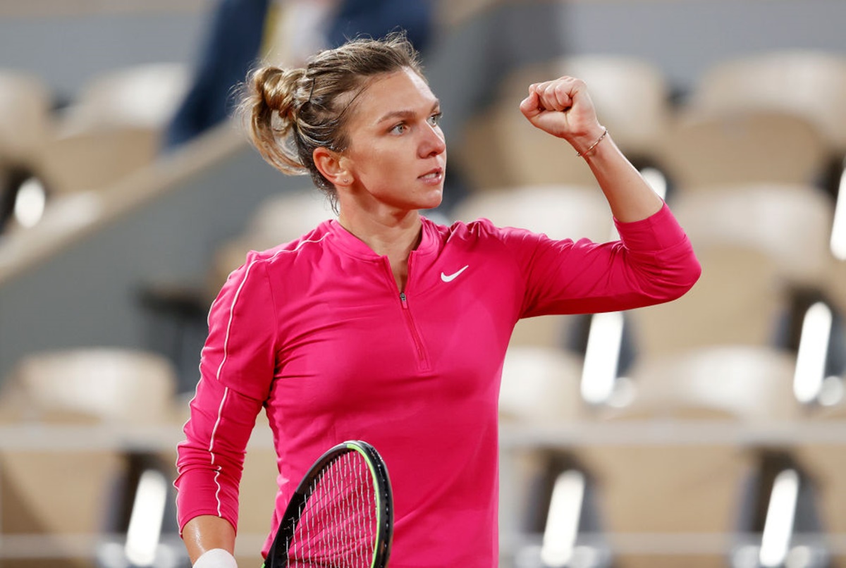 Romania's Simona Halep of Romania celebrates after winning a point during her third round match against Amanda Anisimova.