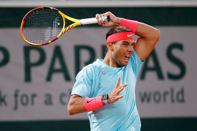 Spain's Rafael Nadal plays a forehand return during his third round match against Italy's Stefano Travaglia
