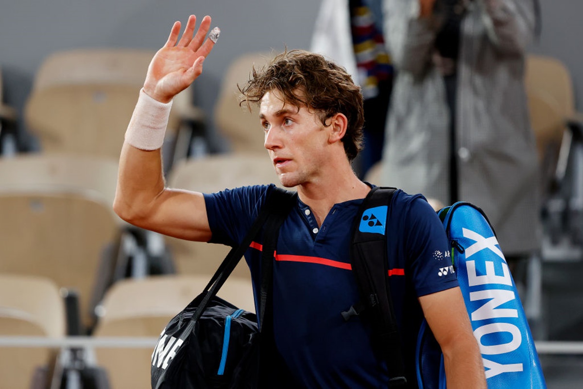 Norway's Casper Ruud walks off the court following defeat to Dominic Thiem.