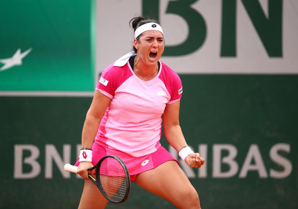 Tunisia's Ons Jabeur celebrates after winning a point during her third round match against Aryna Sabalenka of Belarus.